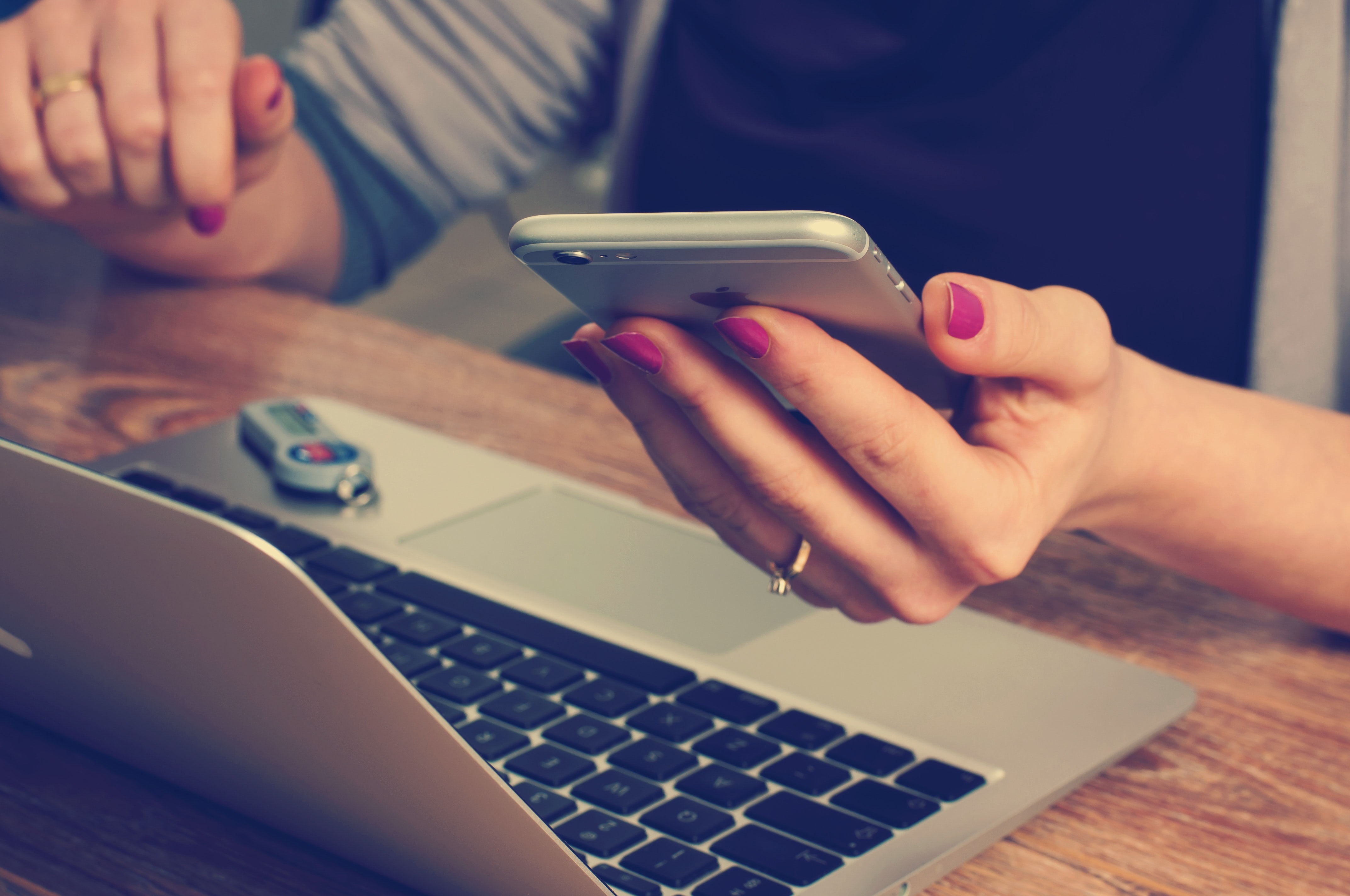 woman of laptop and phone