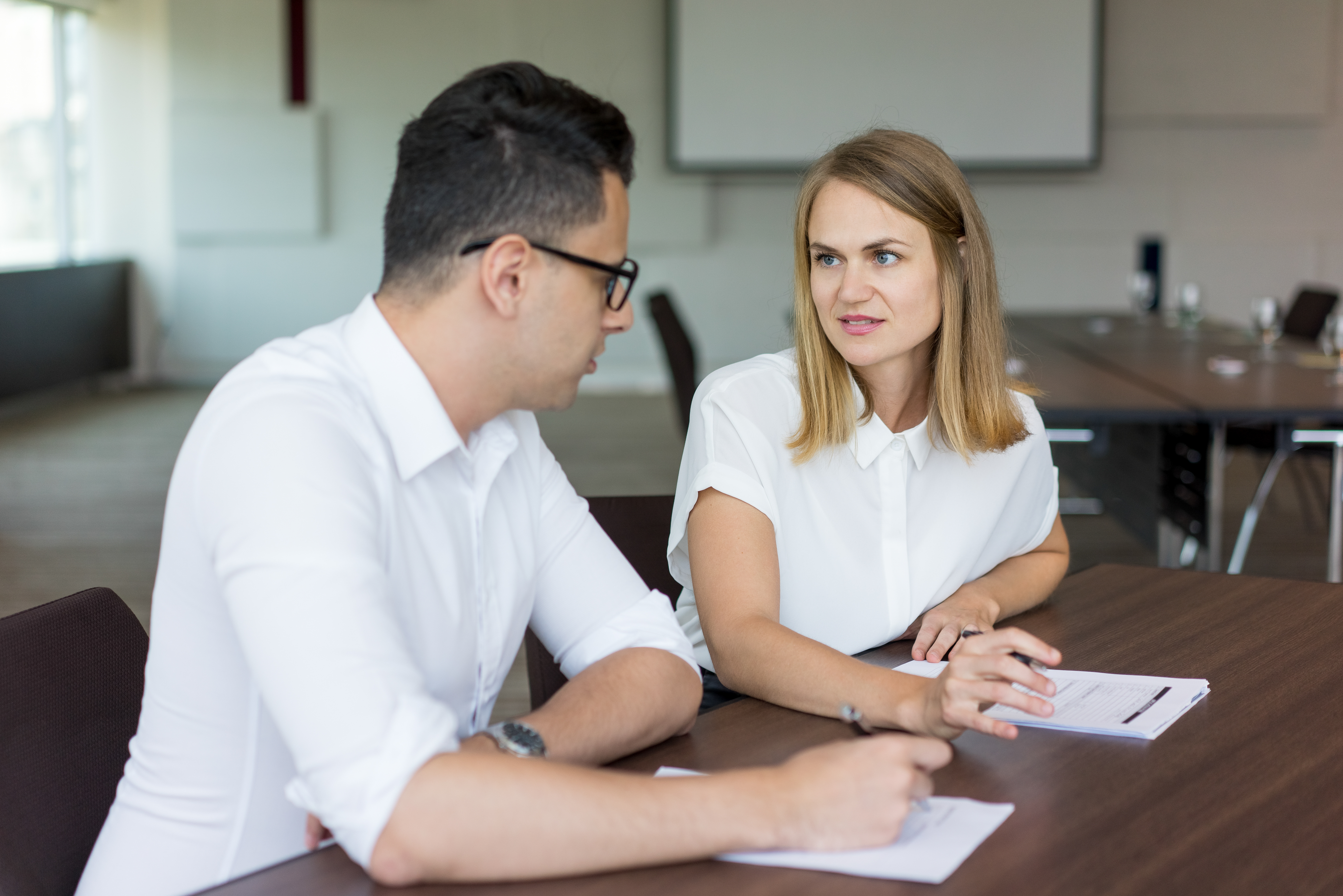 Couple at desks